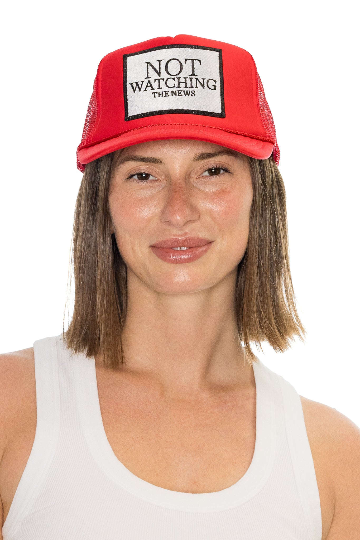 Not Watching The News Trucker Hat in Red
