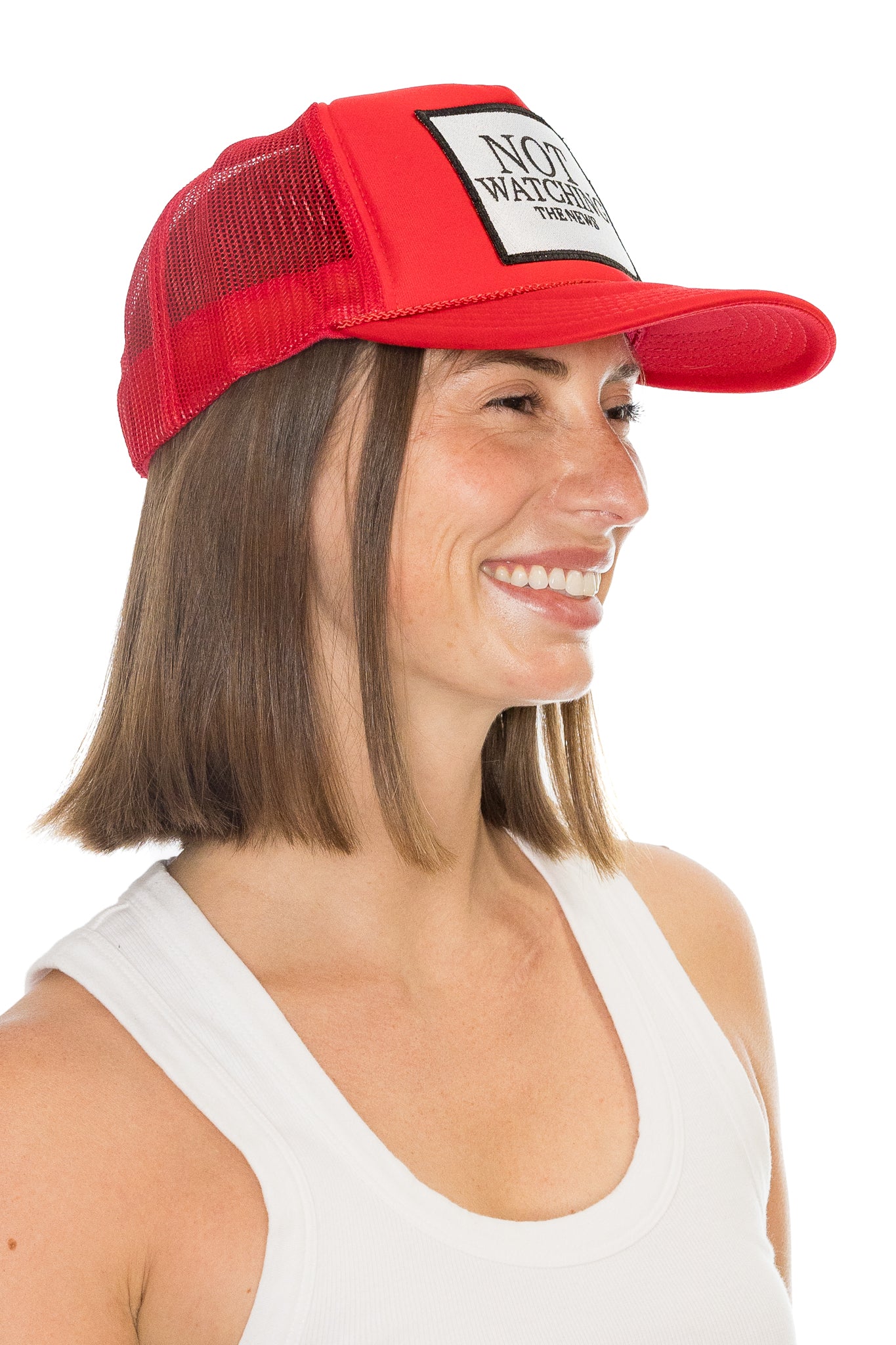 Not Watching The News Trucker Hat in Red