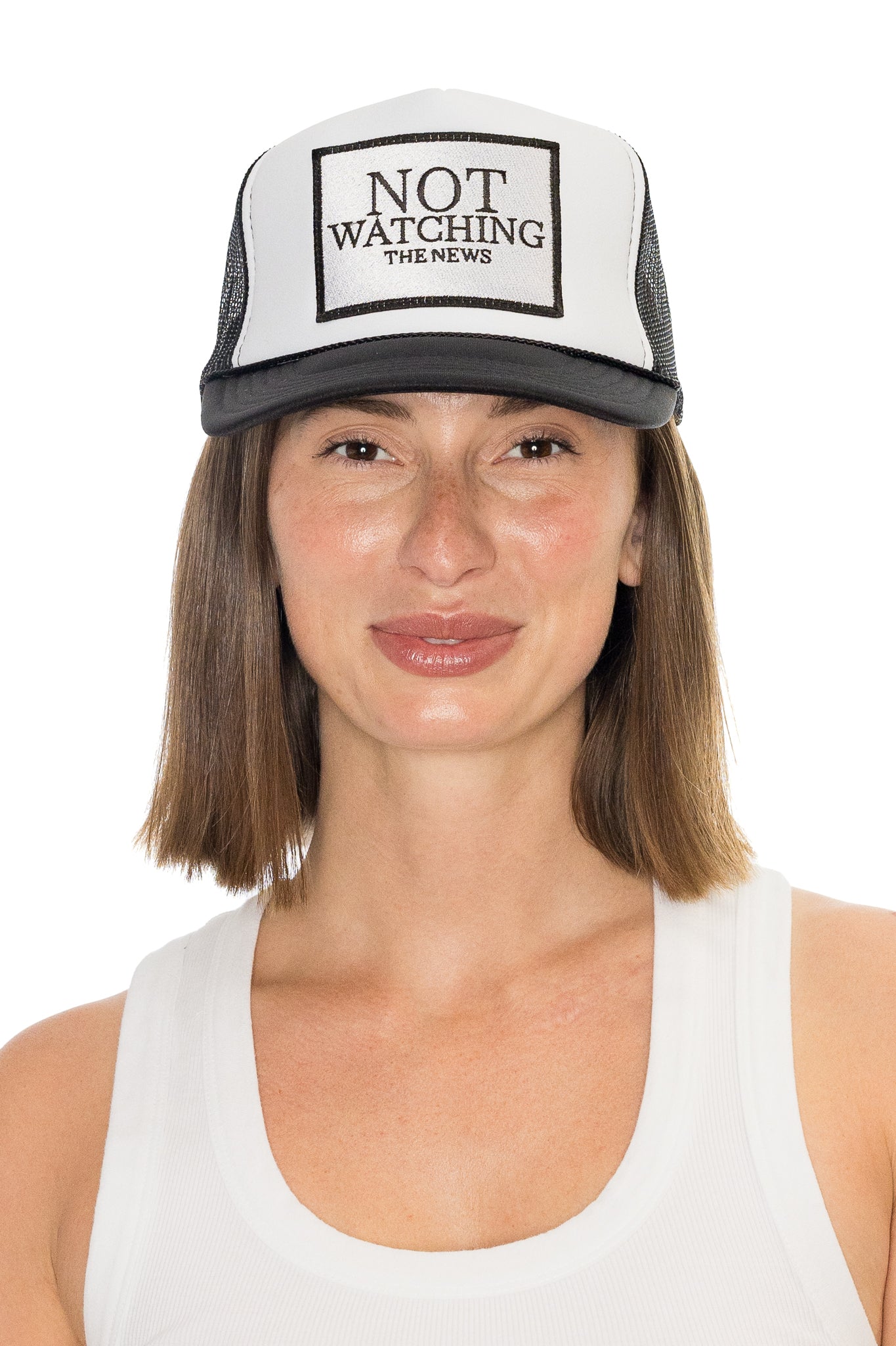 Not Watching The News Trucker Hat in Black and White Split