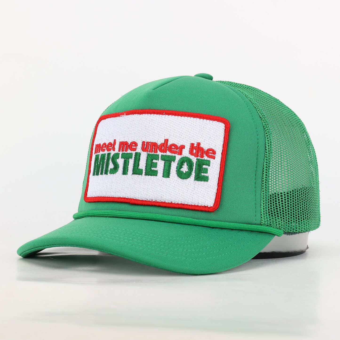 Meet Me Under The Mistletoe Trucker Hat in Green
