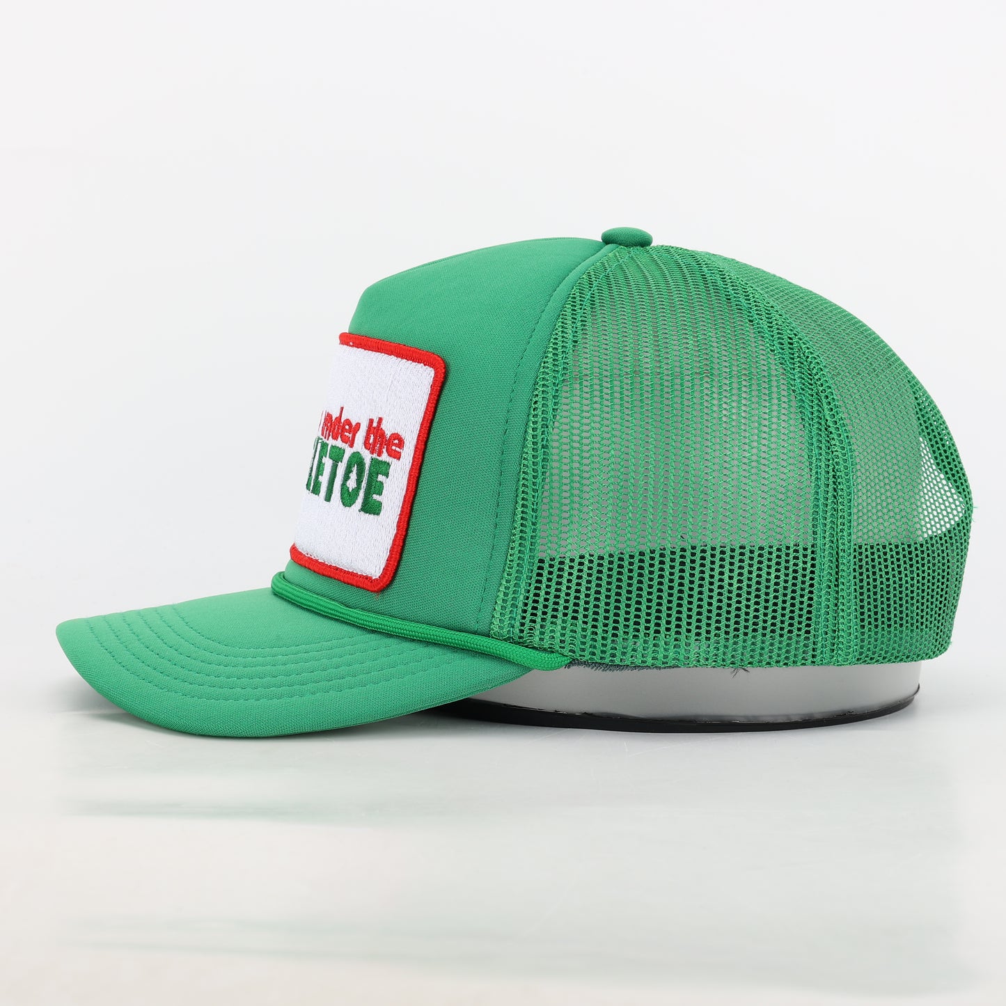 Meet Me Under The Mistletoe Trucker Hat in Green