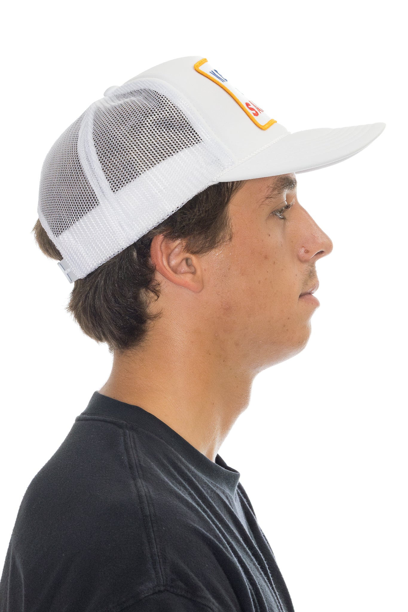 Unisex trucker hat featuring adjustable back and embroidered patch, showcasing a versatile blend of comfort and style