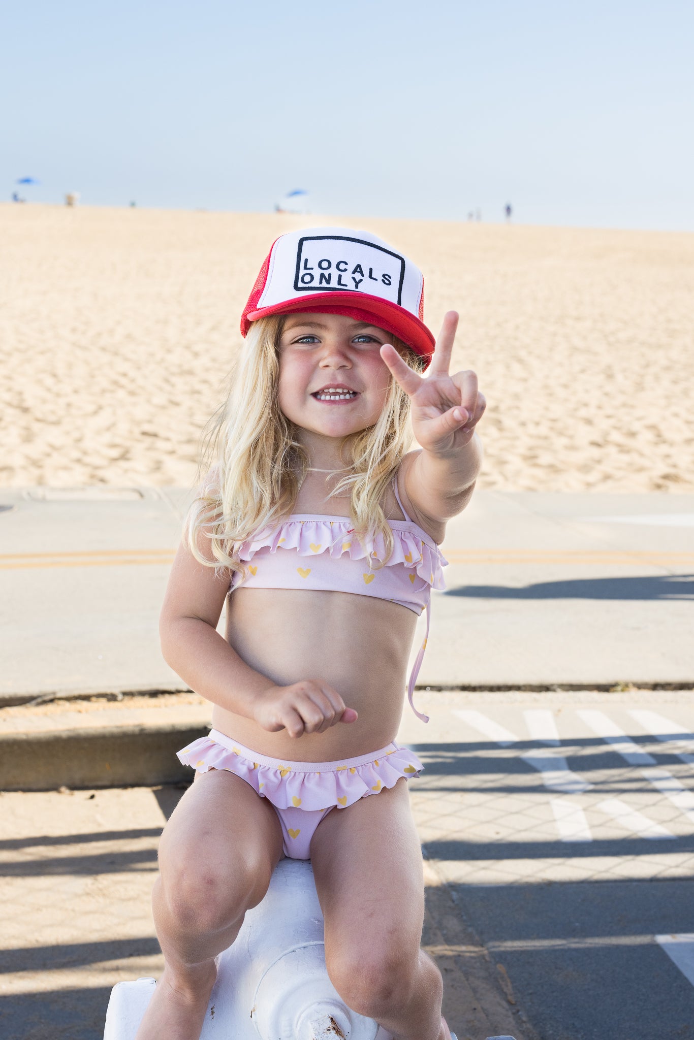 Locals Only Youth Trucker Hat in Red Split