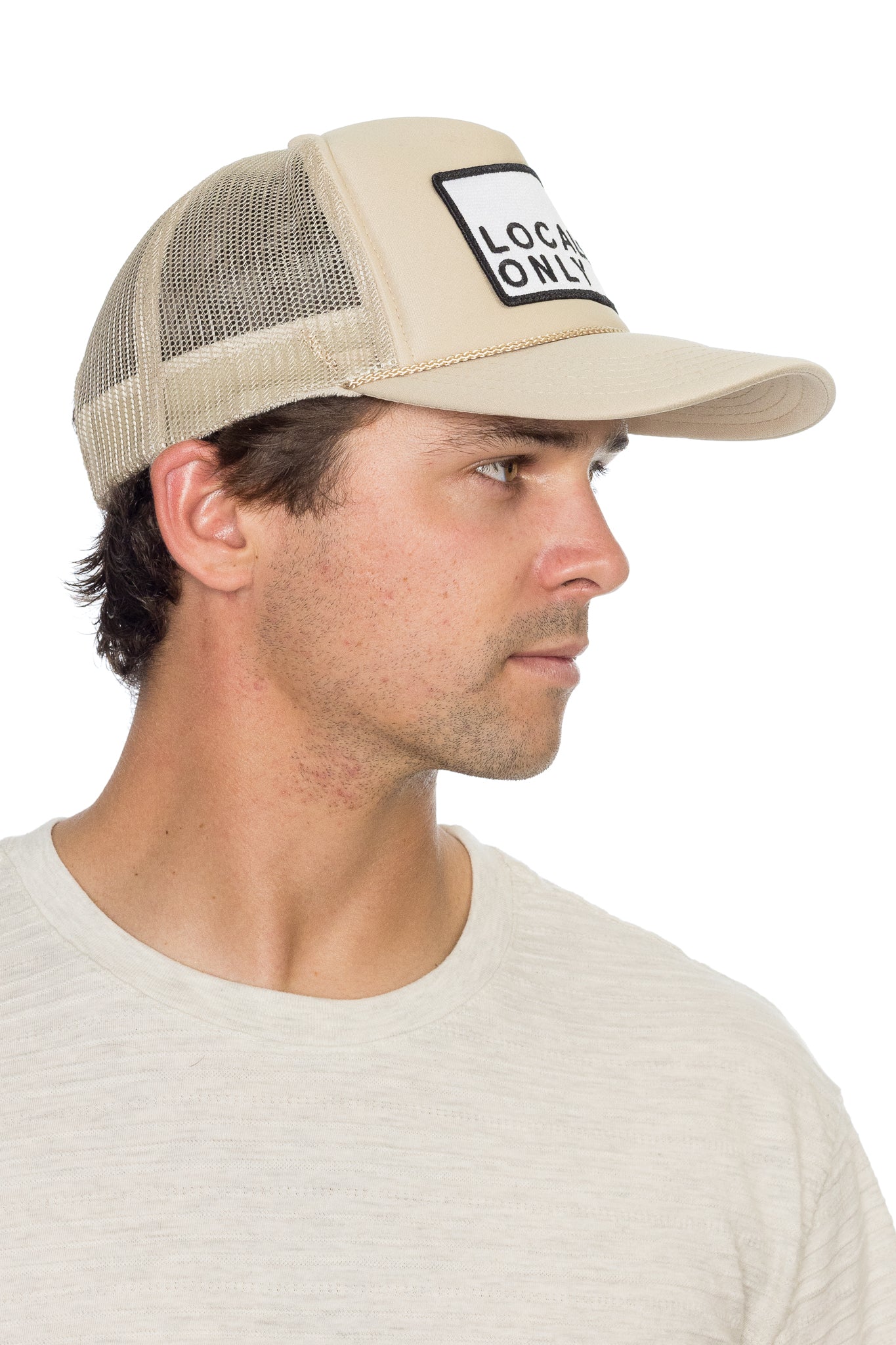 Unisex trucker hat featuring a versatile design with breathable mesh panels and adjustable snapback closure