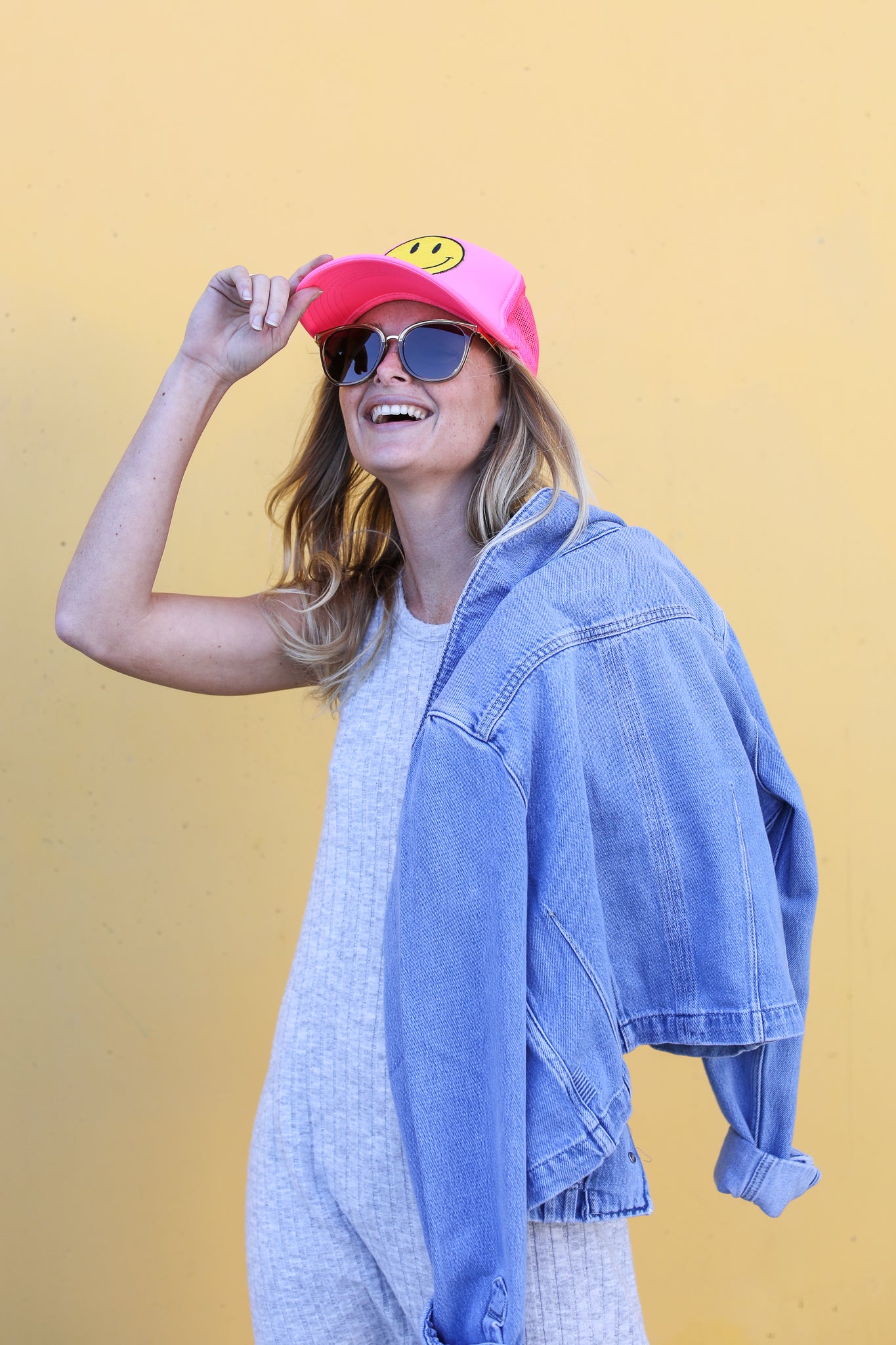 Happy Face Trucker Hat in Pink