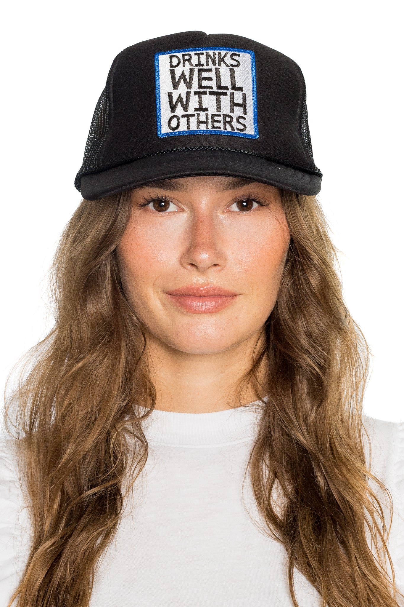 Drinks Well With Others Trucker Hat in Black