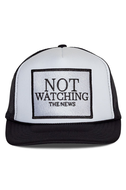 Not Watching The News Trucker Hat in Black and White Split