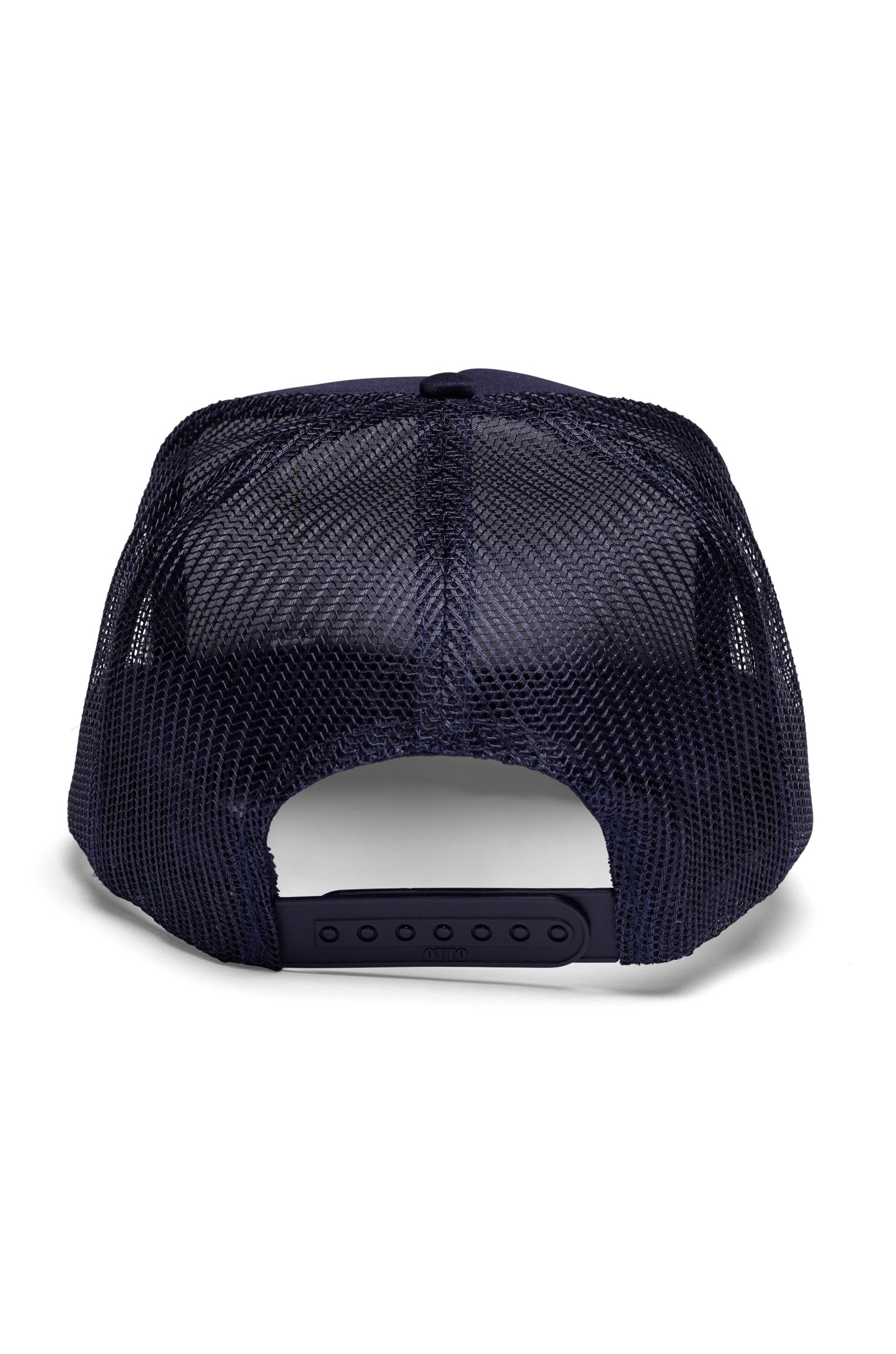 Unisex trucker hat with a mesh back and adjustable closure. Features an embroidered patch at the front