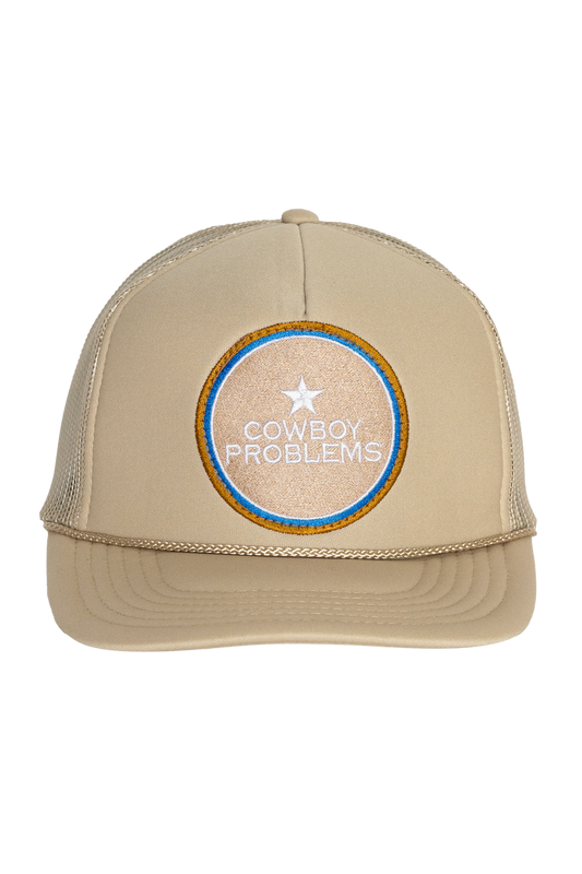 Cowboy Problems Trucker Hat in Tan