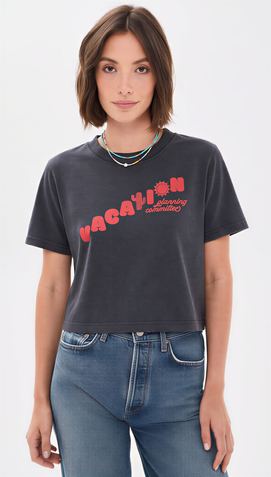 Vacation Planning Committee crop tee in black, front view