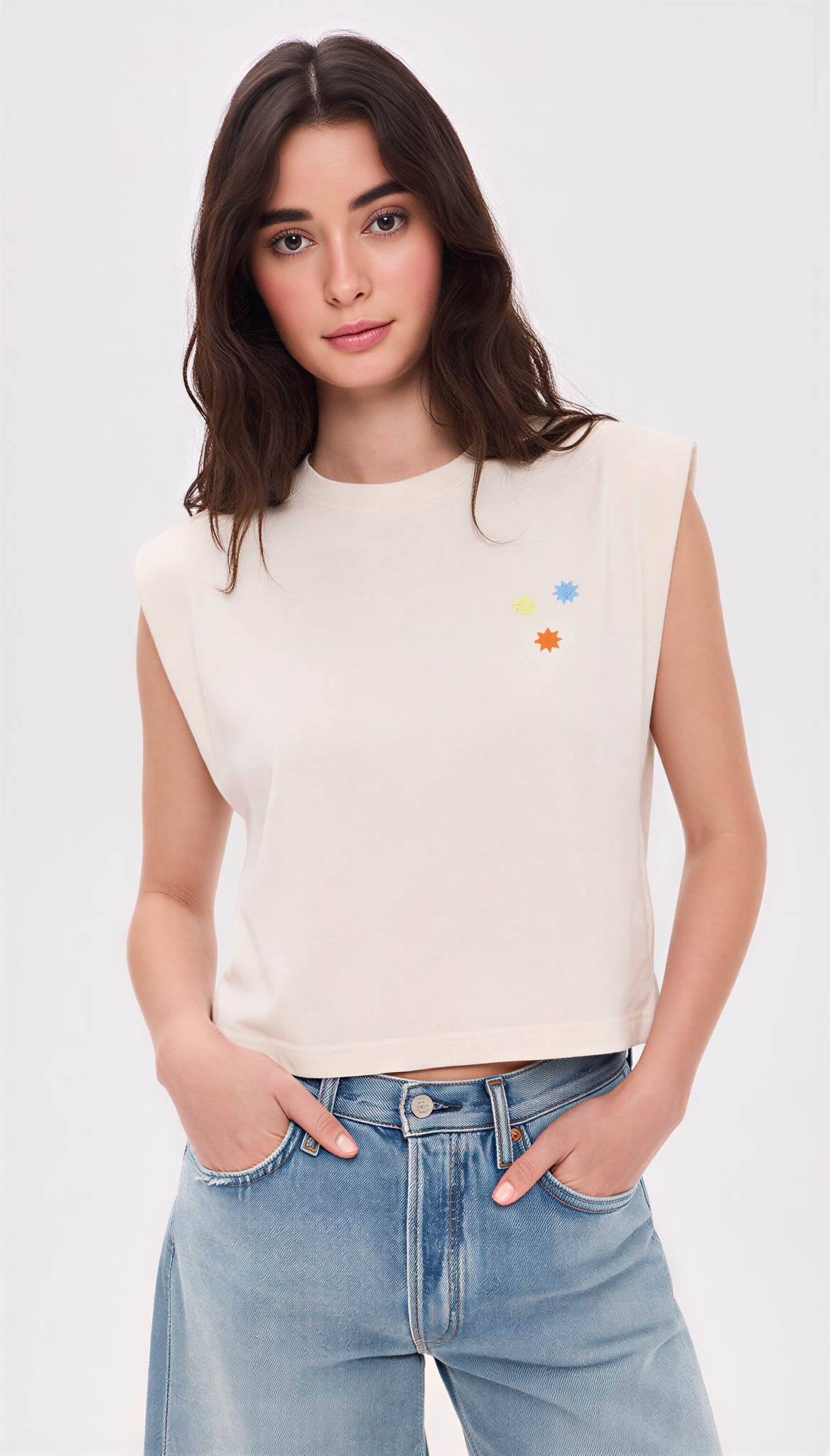 Cream Star Born muscle tank, front view with small screen printed star cluster on the chest