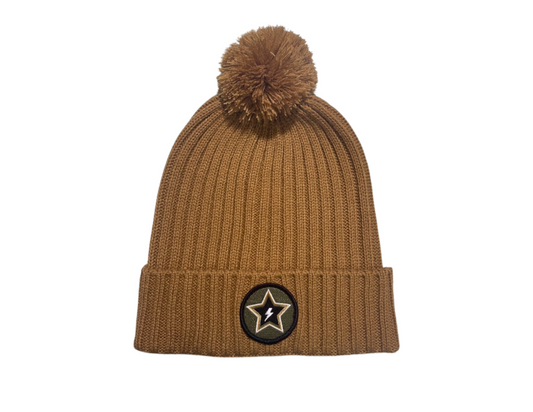 Women's beanie with a puff top and patch front, offering stylish warmth for chilly days